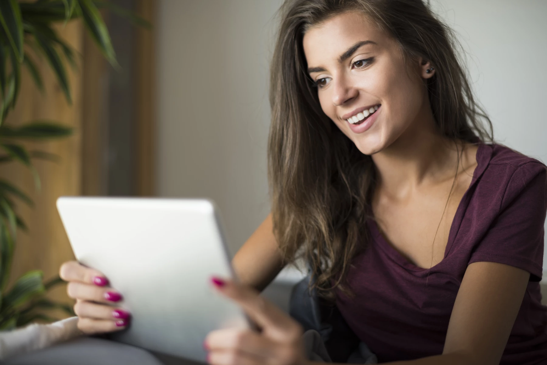 happy-young-woman-with-digital-tablet